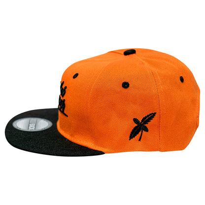 GORRA OFICIAL BORDER GROWER Tipo Snapback Naranja/Negro